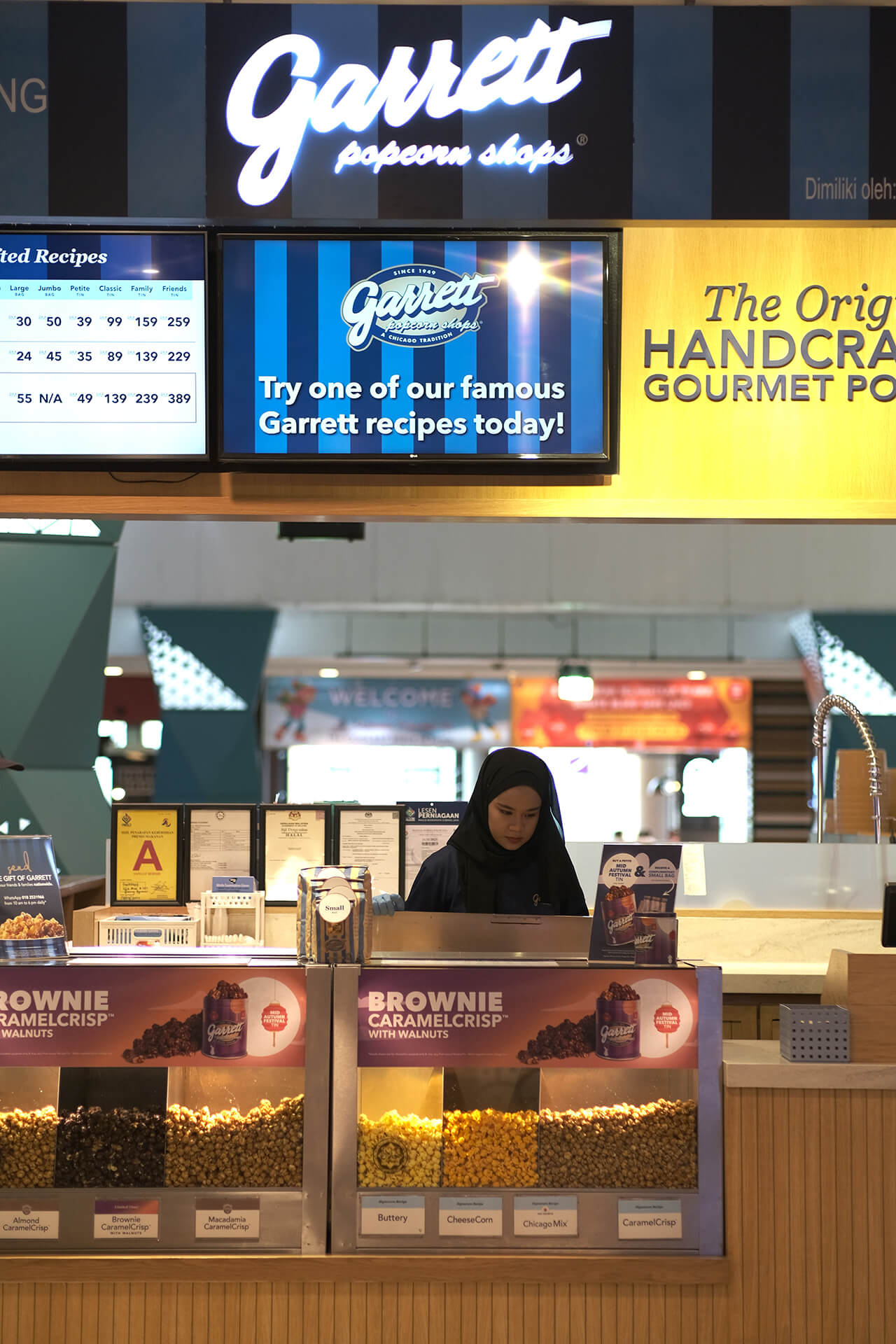 Pair your golden treats with some extra shots of curse! at Garrett Popcorn Shops